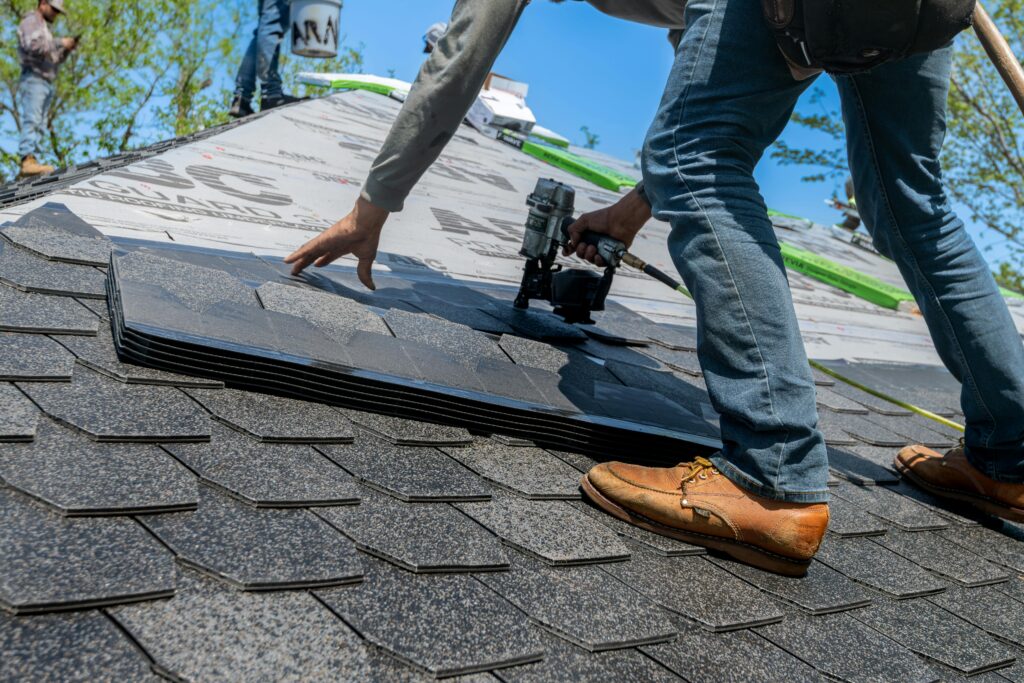 Roofer Using Shingle
